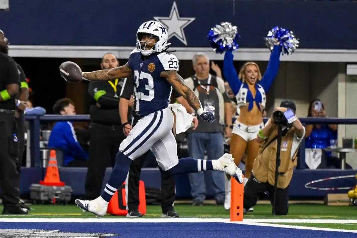 Cowboys running back Rico Dowdle opened the scoring against the Commanders.